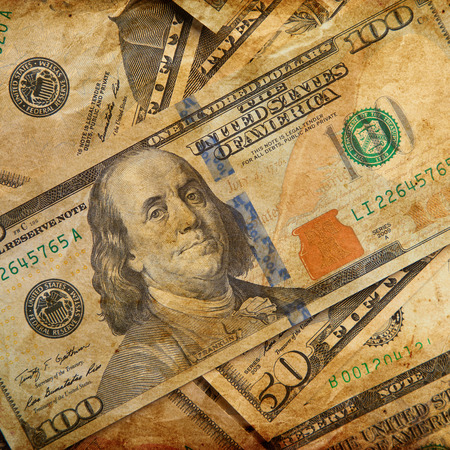 Texture of dollar banknotes on grunge background