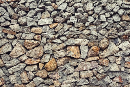 Background texture of the old stone wallの写真素材