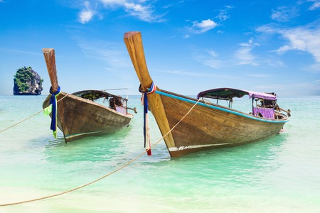 Long boat and tropical beach, Andaman Sea, Thailandの写真素材