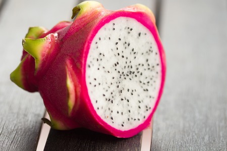 fruit cut the dragon's eye on a wooden backgroundの写真素材