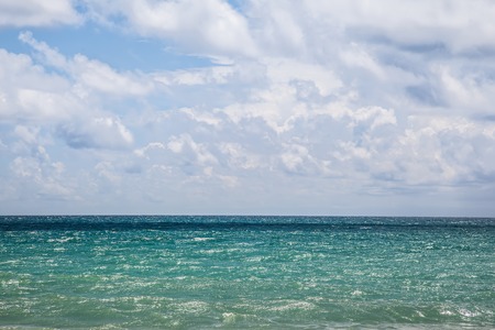 Beautiful tropical blue beach with clouds, Thailandの写真素材