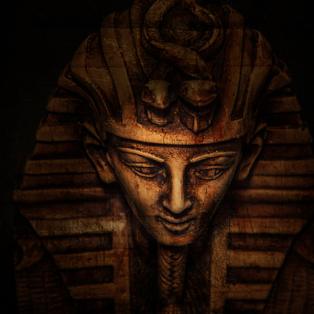 Stone pharaoh tutankhamen mask on dark background