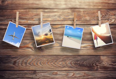 Vacation photos on a old wooden backgroundの写真素材