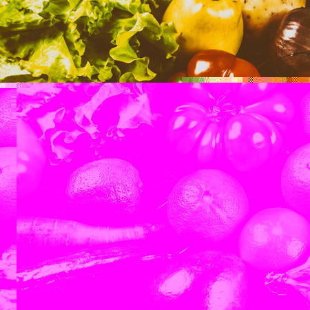 Composition with assorted raw organic vegetables on black wooden backgroundの写真素材