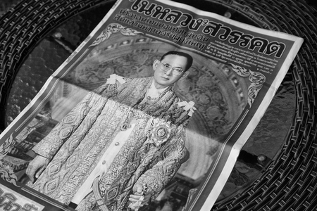 Thailand - October 26,2016 : Newspaper on table with portrait of His Majesty King Bhumibo, and text about death king in 15 Octoberのeditorial素材