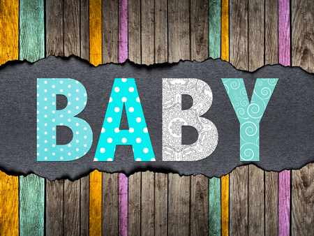 Letters of word baby on a old wooden backgroundの写真素材