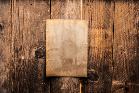 Vintage blank photo on a wooden backgroundの写真素材