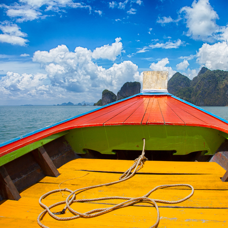Boat trip to tropical islands from Phuket, Krabi in Thailand. Green mountains and blue water lagoonの写真素材
