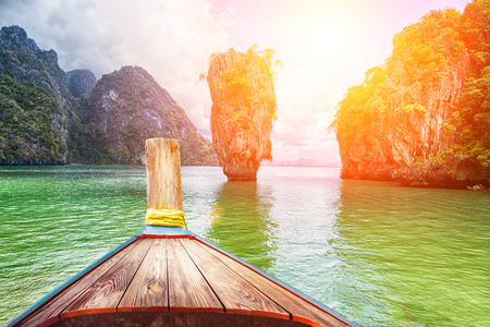 Boat trip to tropical islands from Phuket, Krabi in Thailand. Green mountains and blue water lagoonの写真素材