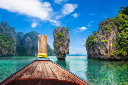Boat trip to tropical islands from Phuket, Krabi in Thailand. Green mountains and blue water lagoonの写真素材