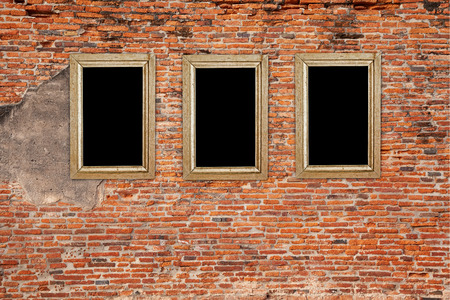 Old wooden frame on the grunge wallの写真素材