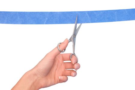 woman cutting a ribbon with scissors for grand openingの写真素材