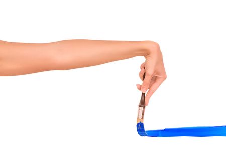 woman drawing the blue line with brush の写真素材