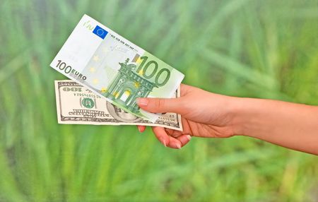 businesswoman giving money for making deal の写真素材