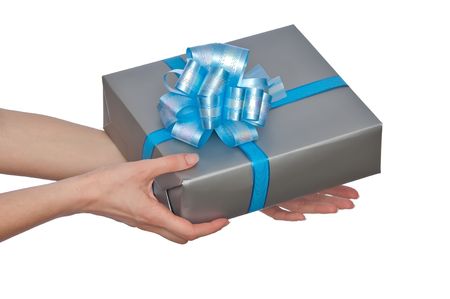 woman giving a present in the grey box with blue bow の写真素材