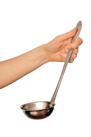 woman holding ladle in the hand for preparing dinner の写真素材