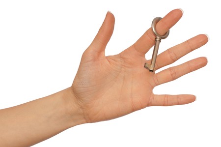 key from big house in the woman's hand