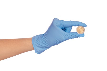 doctor holding fake of euro in the hand