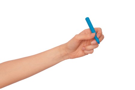 businesswoman drawing scheme with blue felt-tip penの写真素材