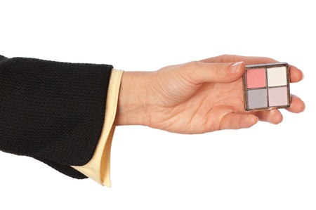 woman holding in the hand one quadrate with colored eye shadowの写真素材