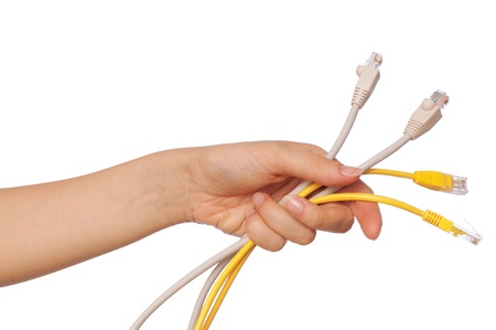 woman holding LAN cords in the handの写真素材