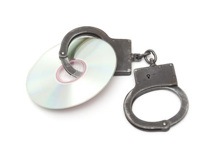 Cd with handcuffs isolated on whiteの写真素材