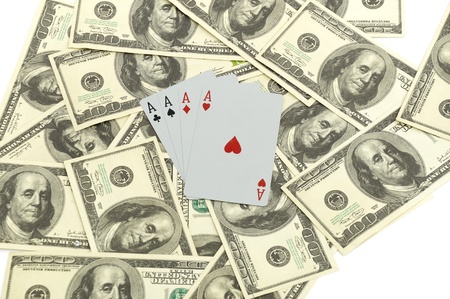 4 aces Cards on 100 dollars background