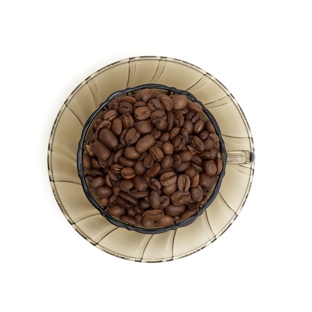 coffee beans in cup made of gray glassの写真素材