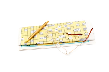 Glasses, pen over mutual funds data on newspaperの写真素材