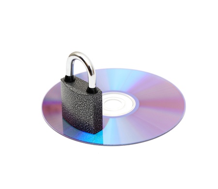 Lock on a cd isolated on white backgroundの写真素材