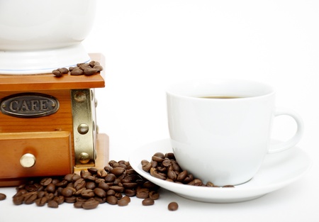 Coffee Grinder and cup isolated on whiteの写真素材