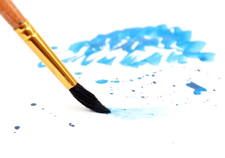 brush with blue paint stroke and stick, isolated on whiteの写真素材