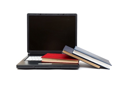 Concept illustrating evolution from books to computers isolated on whiteの写真素材