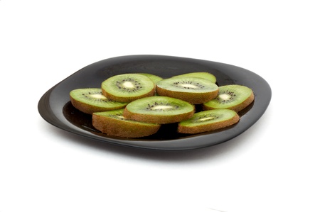 Cut kiwi isolated on a white backgroundの写真素材