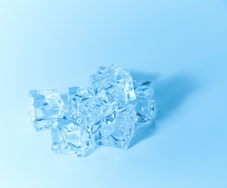 stack of blue Ice cubes on blue backgroundの写真素材