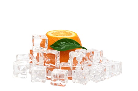 Orange and ice cubes food background on whiteの写真素材