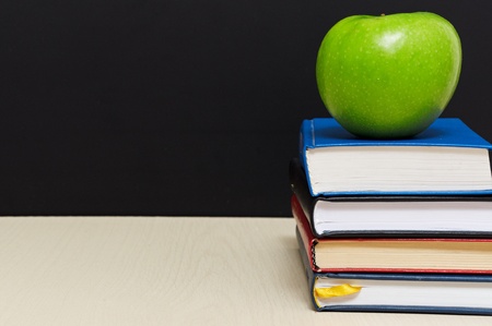 books and an apple back to school conceptの写真素材