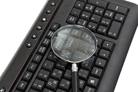 Online Search Concept. magnifying glass on keyboard