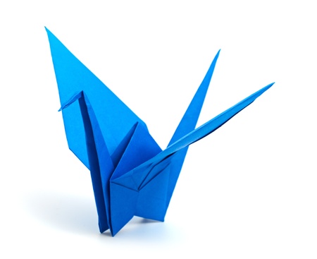Origami crane isolated on a white backgroundの写真素材