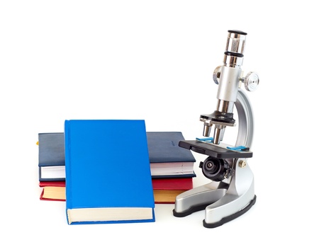 Microscope, books isolated on a white backgroundの写真素材