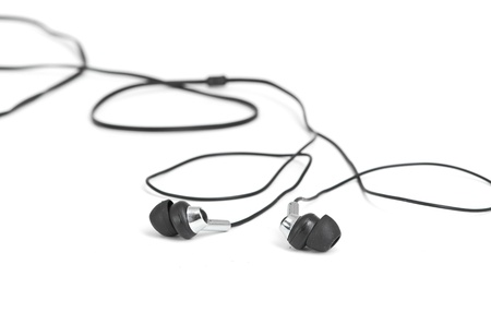 black Headphones isolated on a white backgroundの写真素材