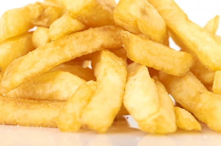 a pile of french fries on a white backgroundの写真素材