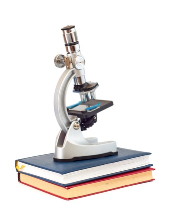 Microscope, books isolated on a white backgroundの写真素材