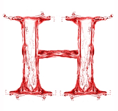 Red liquid letter isolated on white backgroundの写真素材