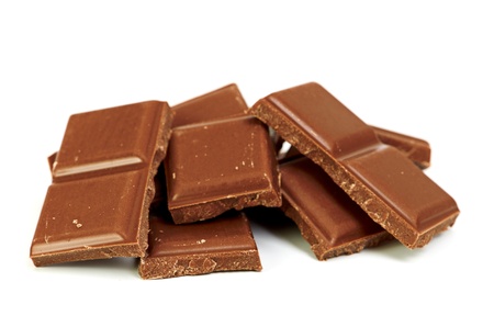 Broken chocolate bar on a white background
