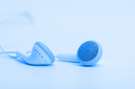 concept of digital music white Headphones blueの写真素材