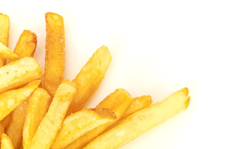 a pile of french fries isolated on whiteの写真素材