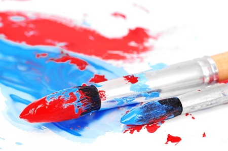 brush and paint scratch isolated on whiteの写真素材