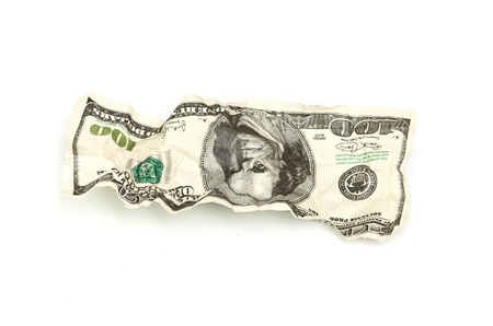 crumpled hundred dollar isolated on white backgroundの写真素材