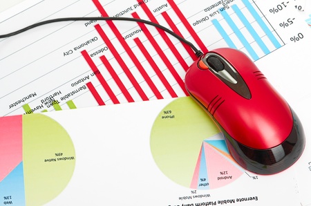 financial graph with computer mouseの写真素材